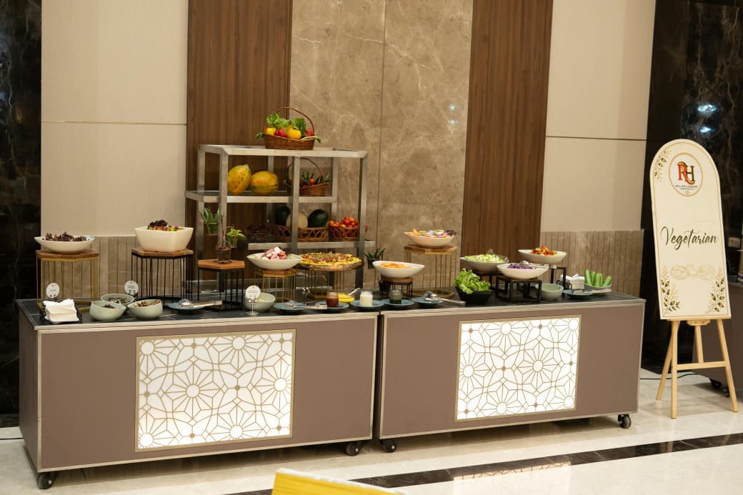 Close view of the salad station on the vegetarian counter