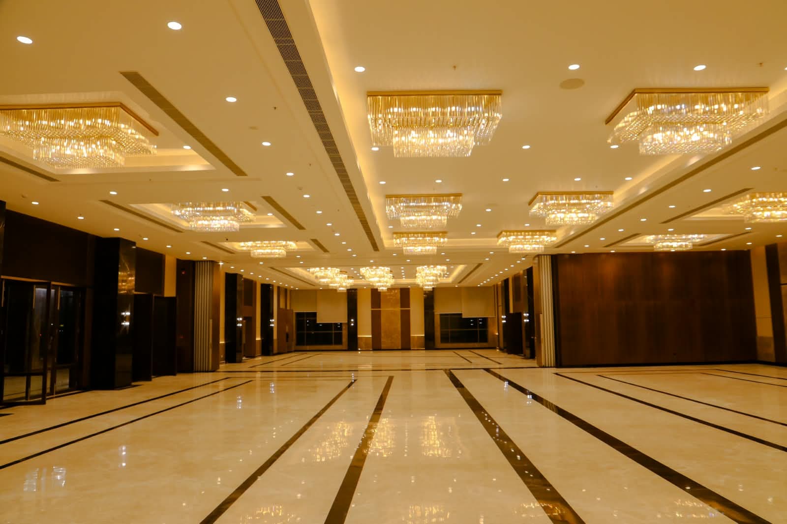 Dominikos hall with its glazed outer wall on one side and movable teak partitions on the other